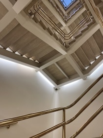 A clean and bright staircase in a traditional Bavarian building, freshly maintained.