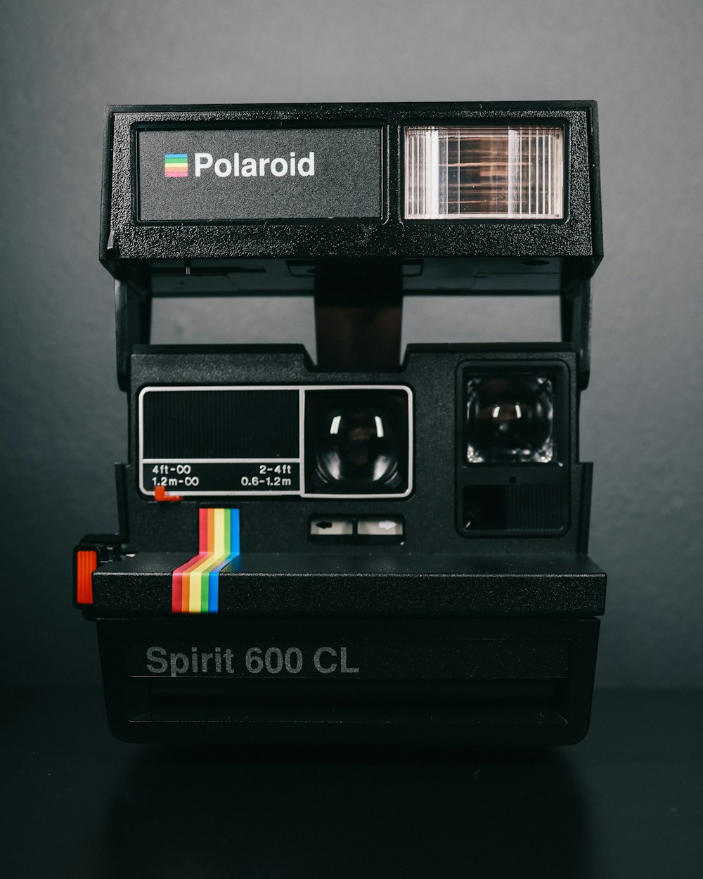 A polaroid camera sitting on top of a table photo – Free United states  Image on Unsplash