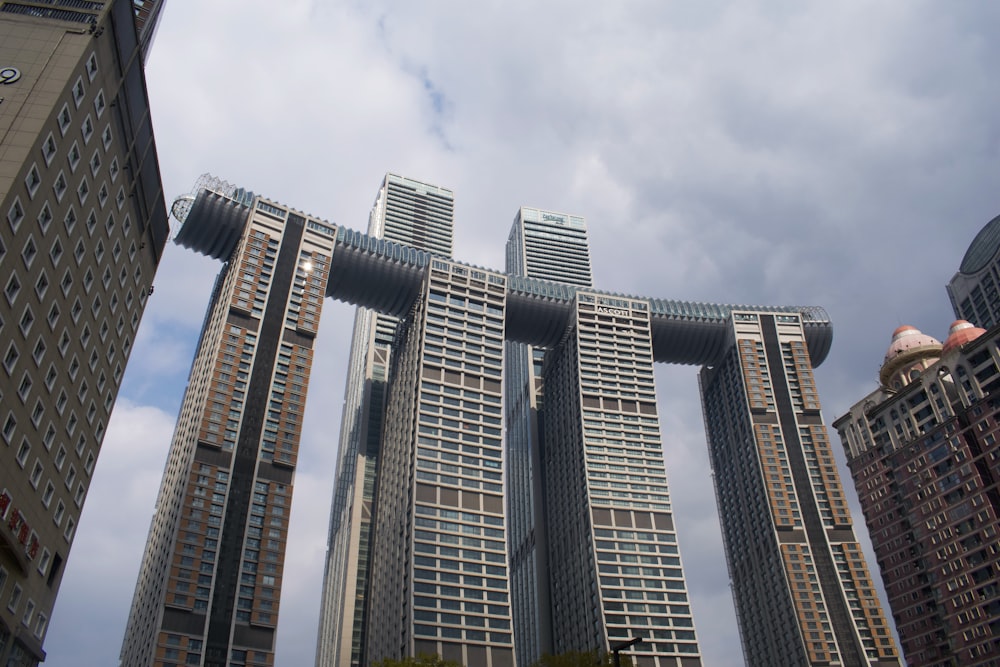 a group of tall buildings in a city