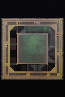 an aerial view of a building with a green roof