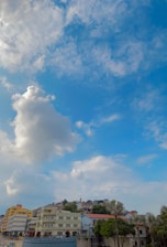A scenic view of a building with vibrant colors and a clear blue sky.