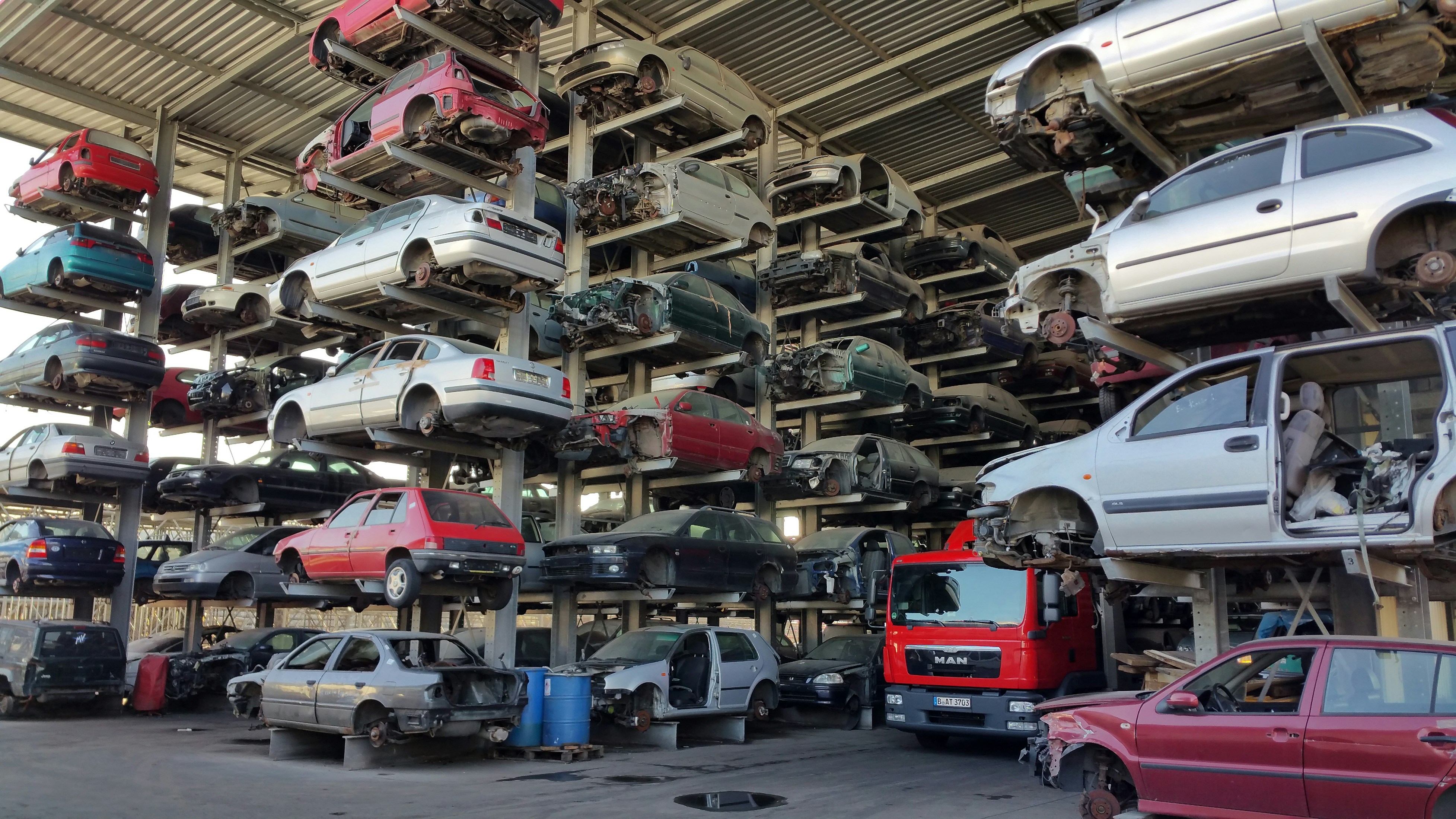 Stacks of dismantled car speedometers ready for eco-friendly recycling.