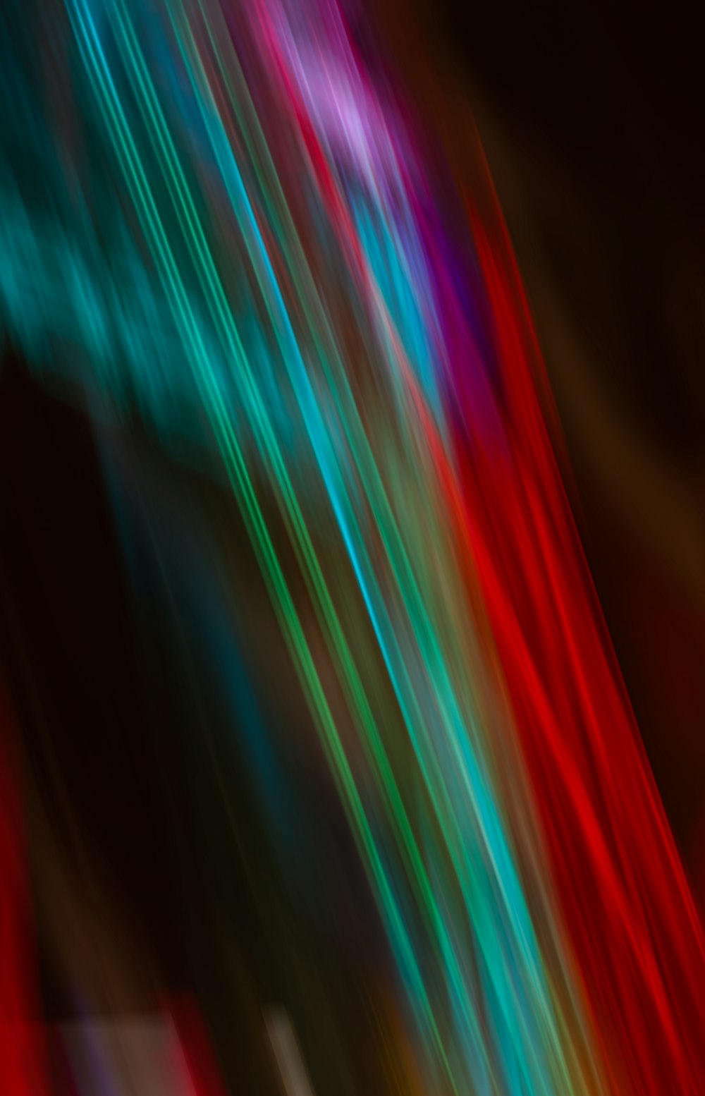 a blurry photo of a red, green, and blue object