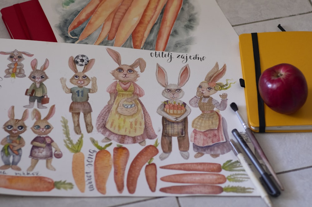 um desenho de cenouras e coelhos em uma mesa