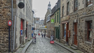 a cobblestone street in a european city