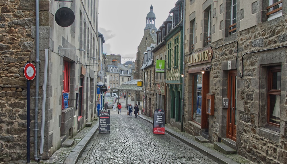 a cobblestone street in a european city