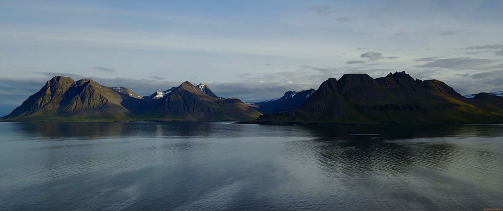 a large body of water surrounded by mountains