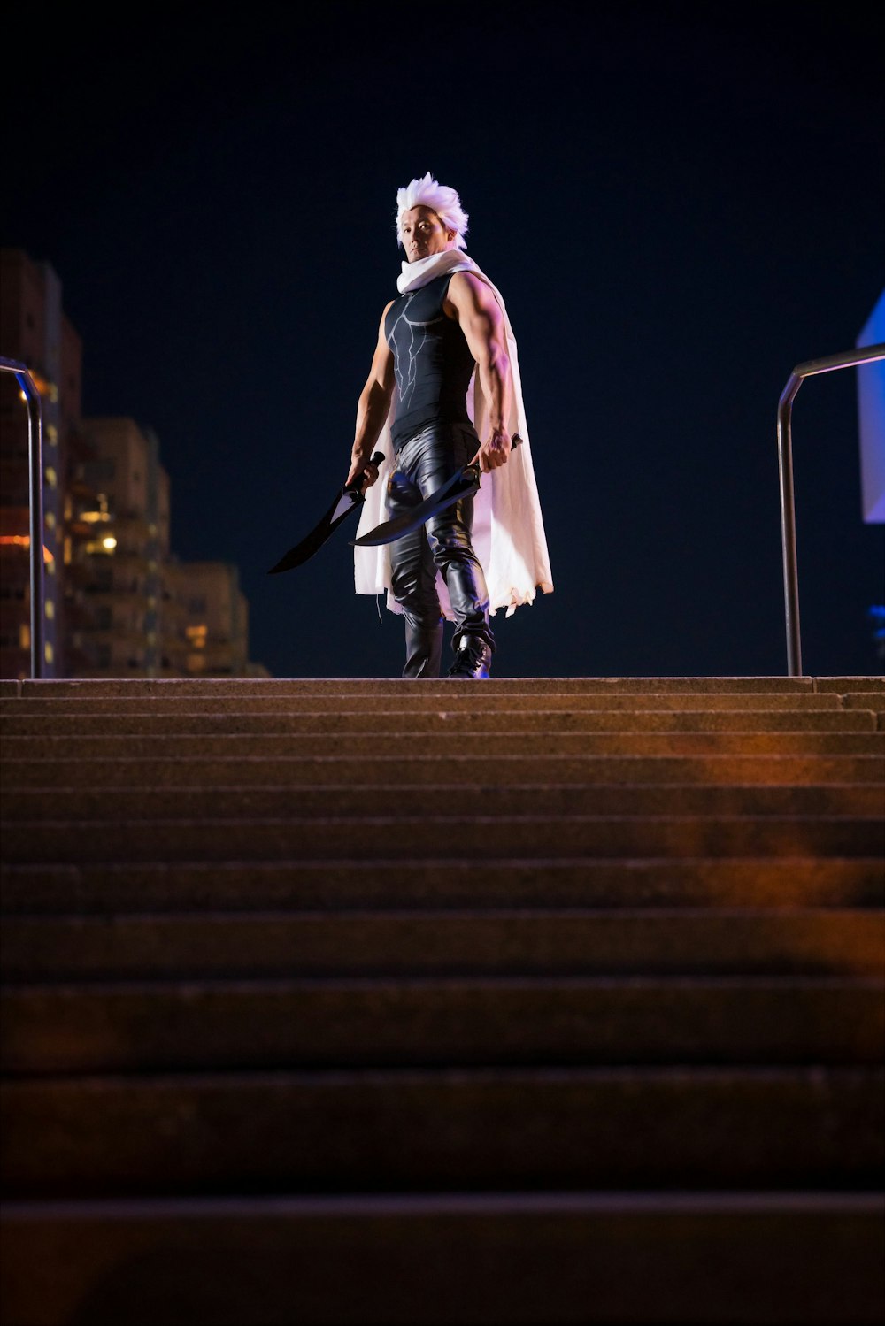 a man in a costume walking up some steps