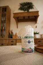 a close up of a bottle of air freshener on a table