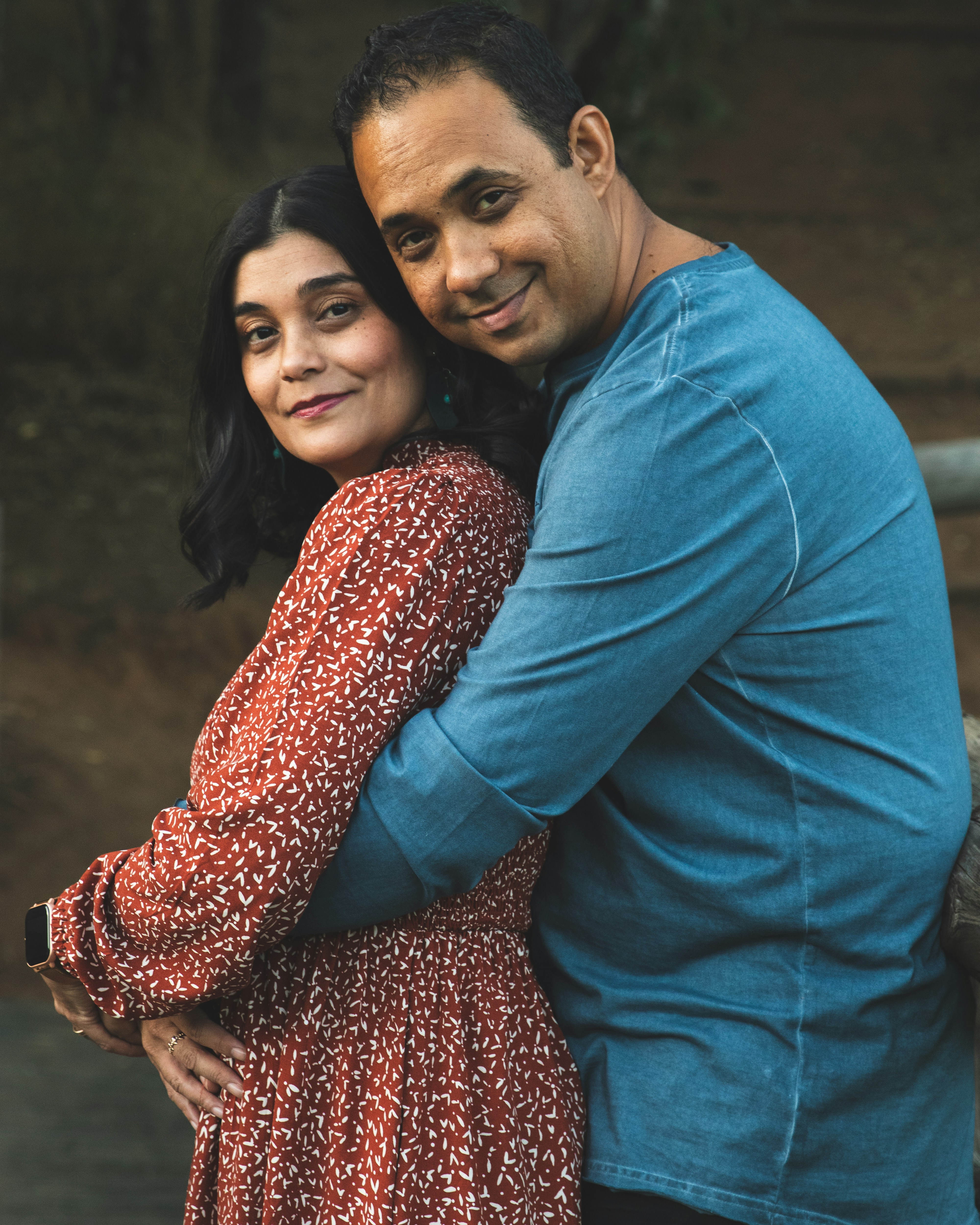 a man and a woman hugging each other