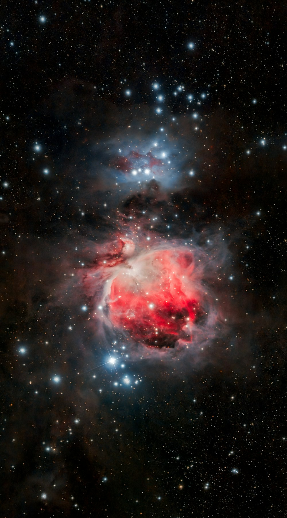 a red and blue star surrounded by stars