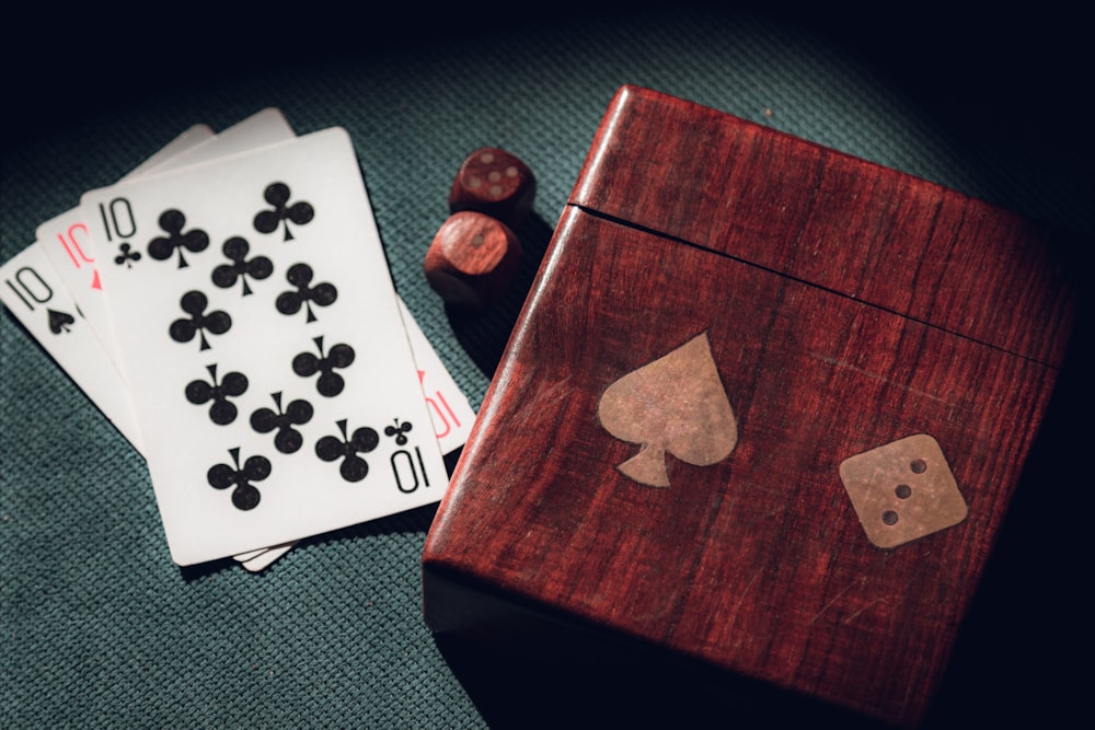 playing cards and dice on a table
