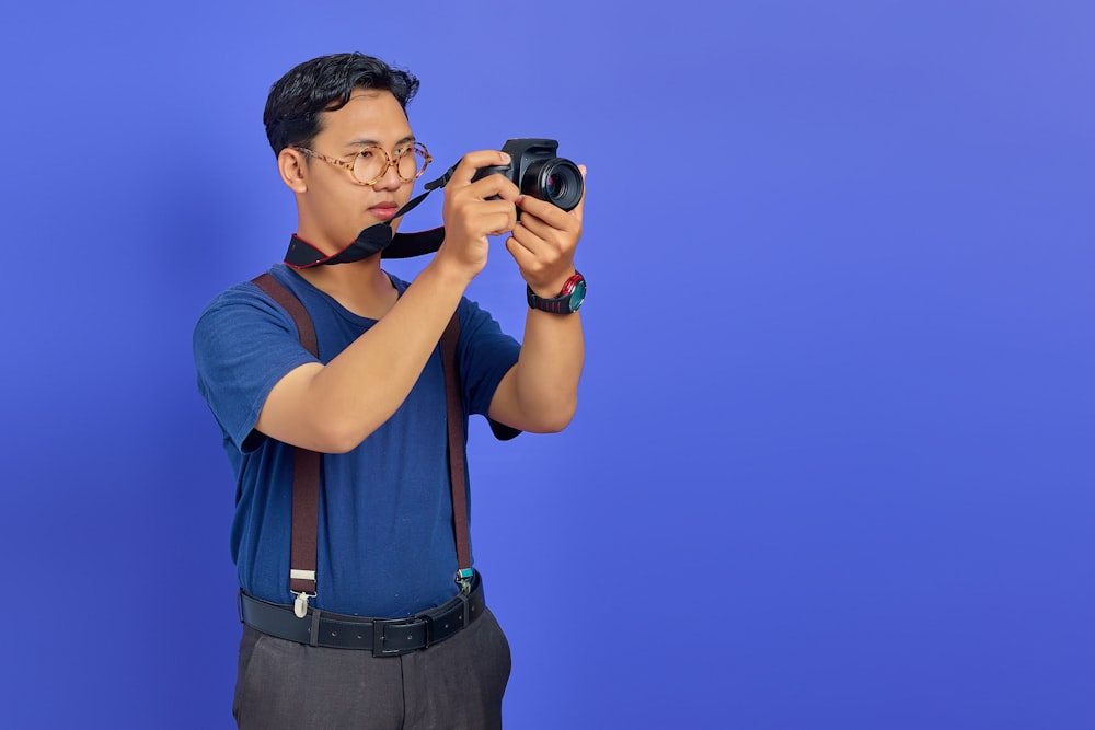 a man taking a picture of himself with a camera