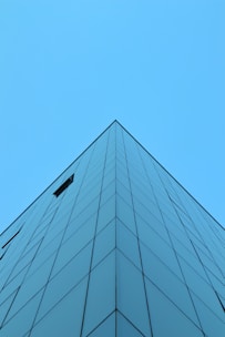 a very tall building with a sky in the background