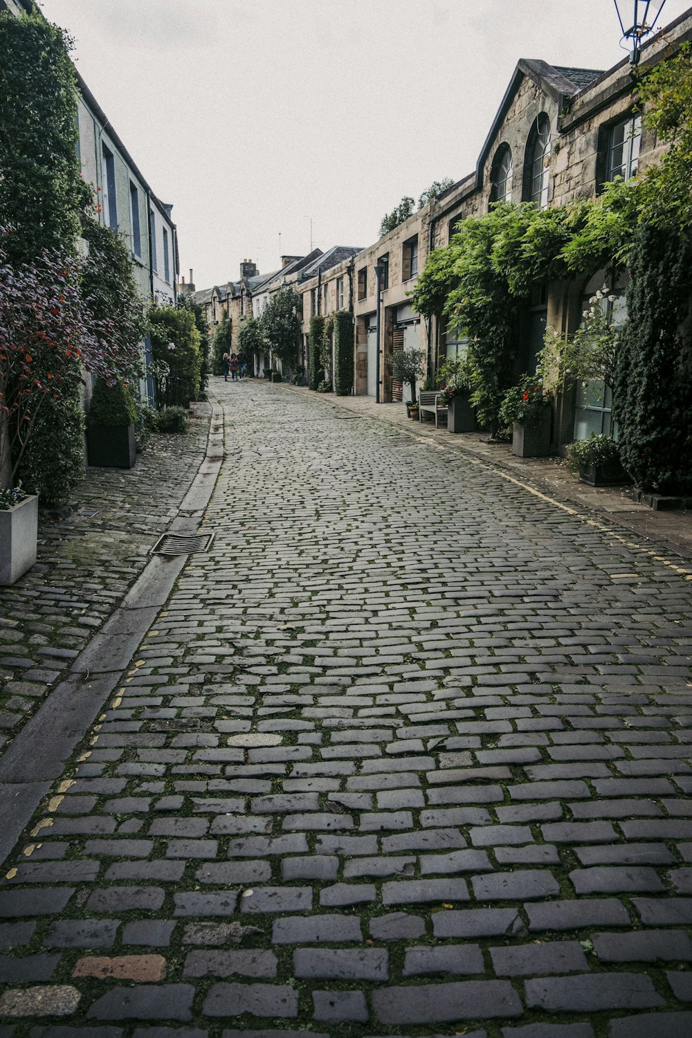 a cobblestone street in a small town