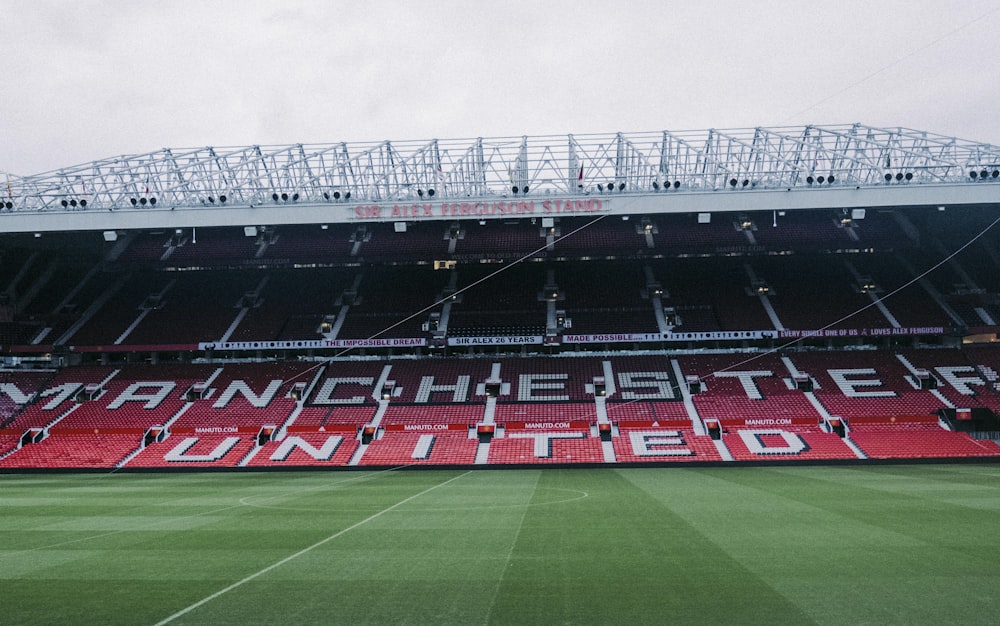 a soccer field with a banner on the side of it