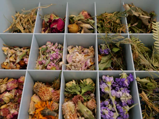 a box filled with lots of different types of flowers