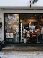 Photo of a small local bakery with customers enjoying fresh bread.