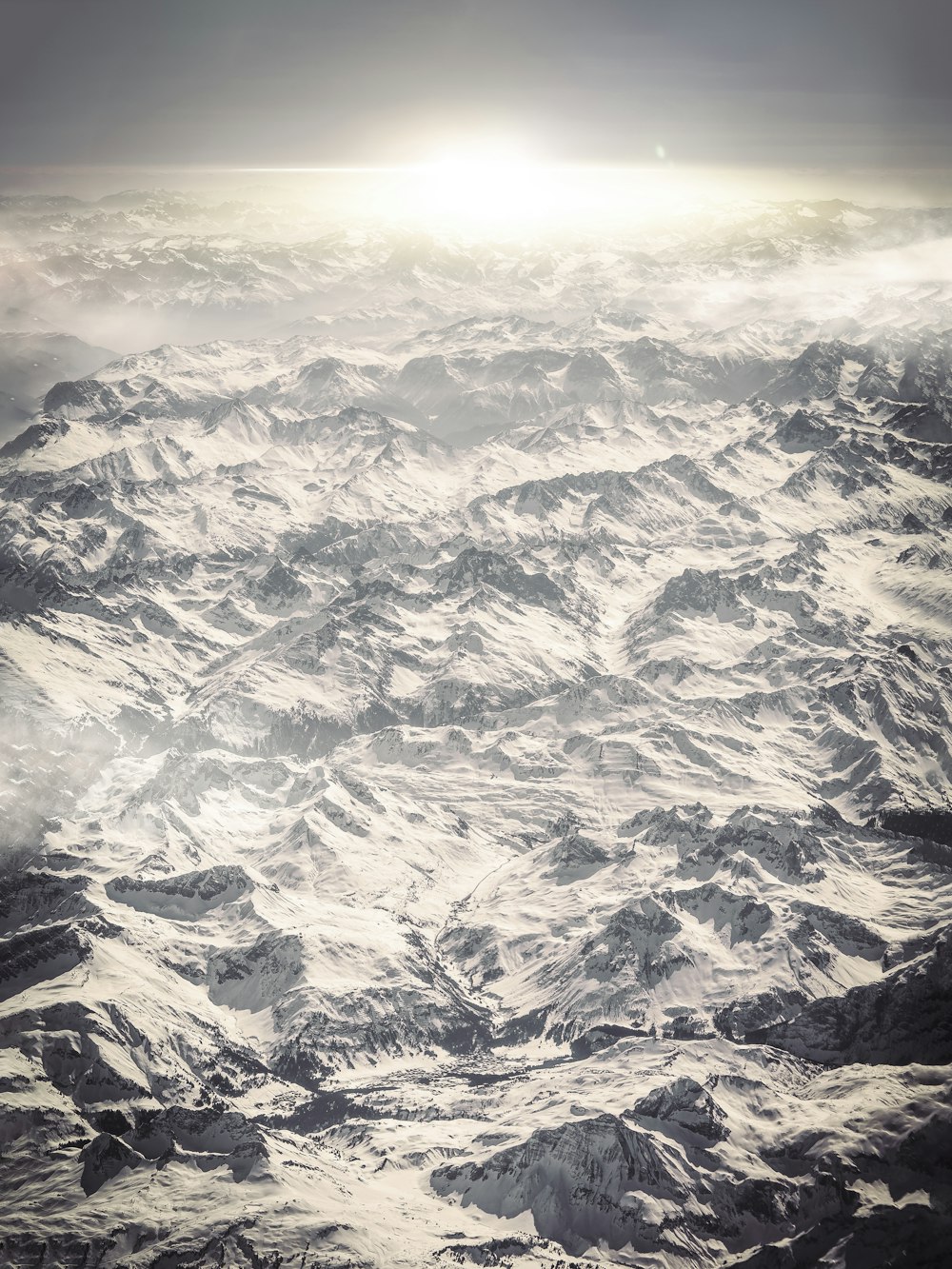 a view of a mountain range from an airplane