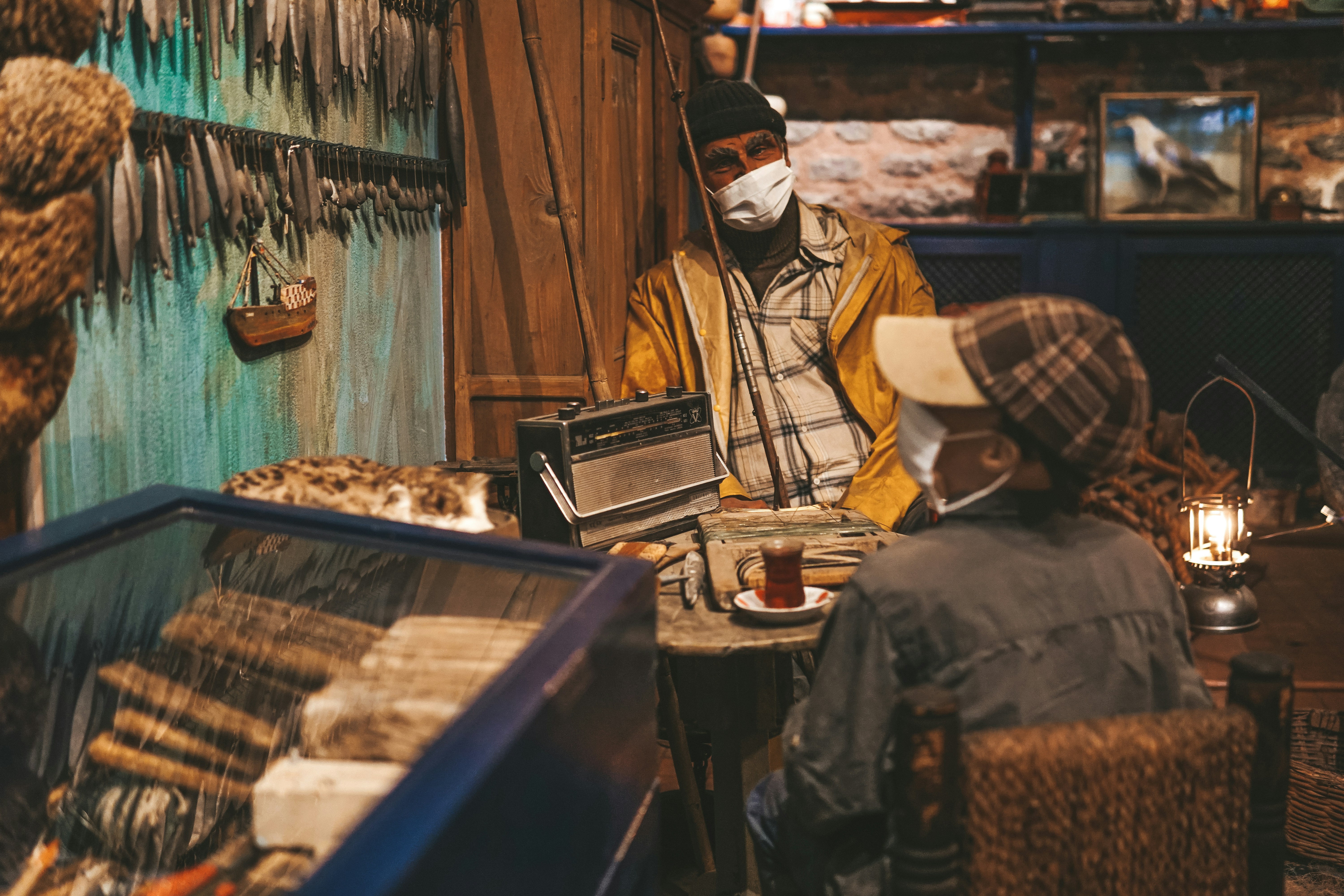 small business owner working on laptop in storefront