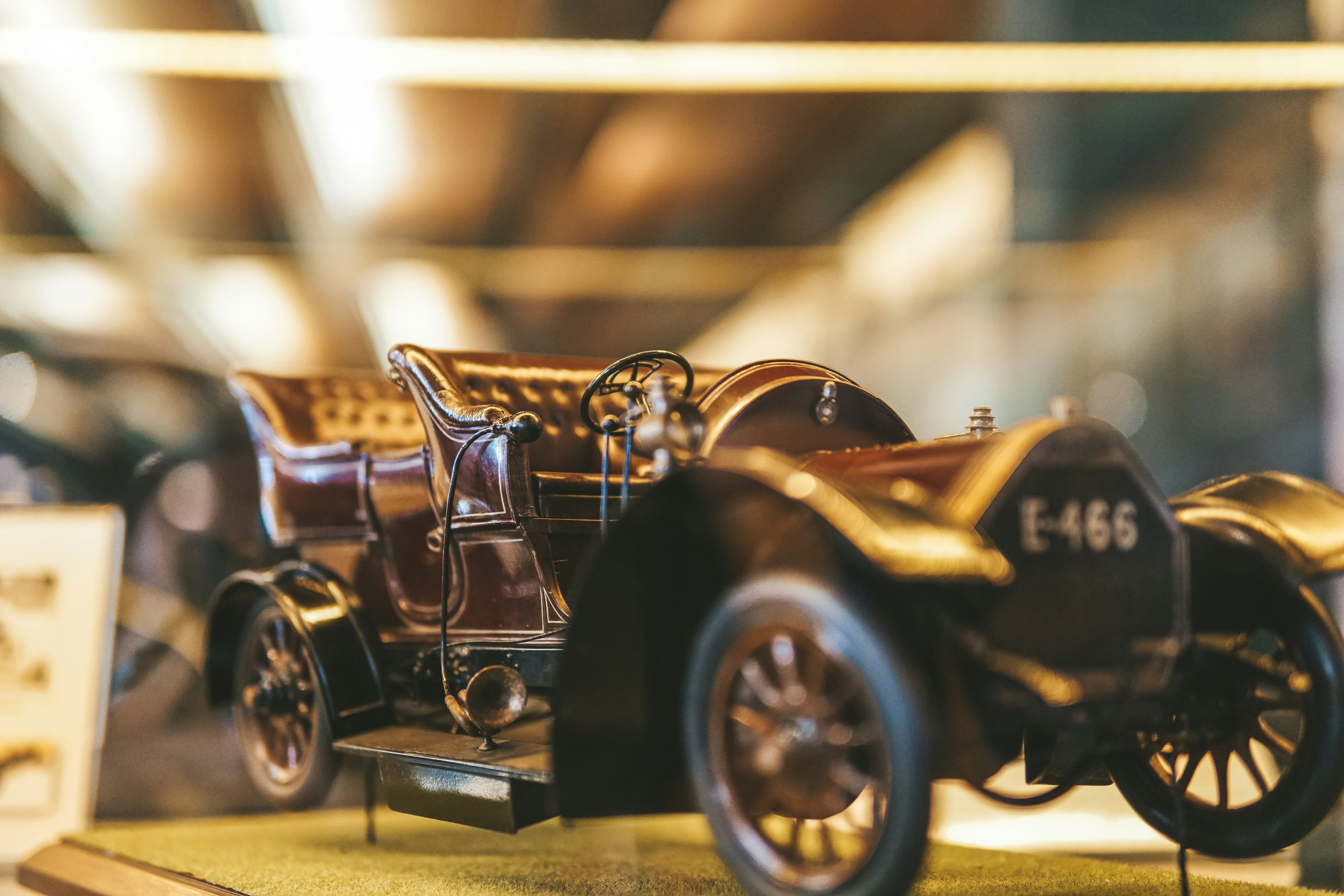 a model of a car on display in a glass case