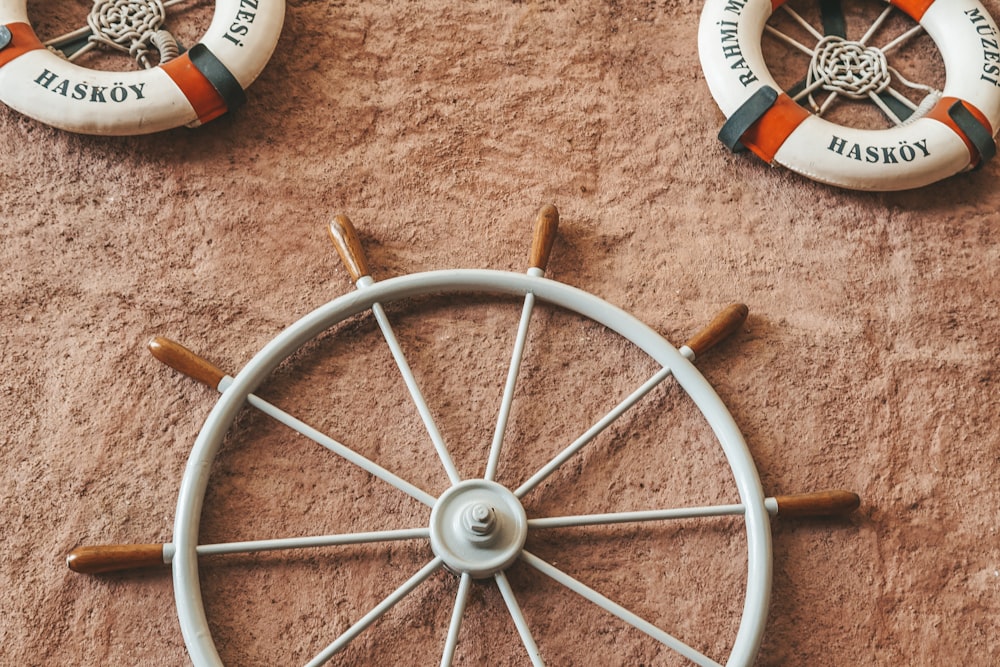 a close up of a wheel on a wall