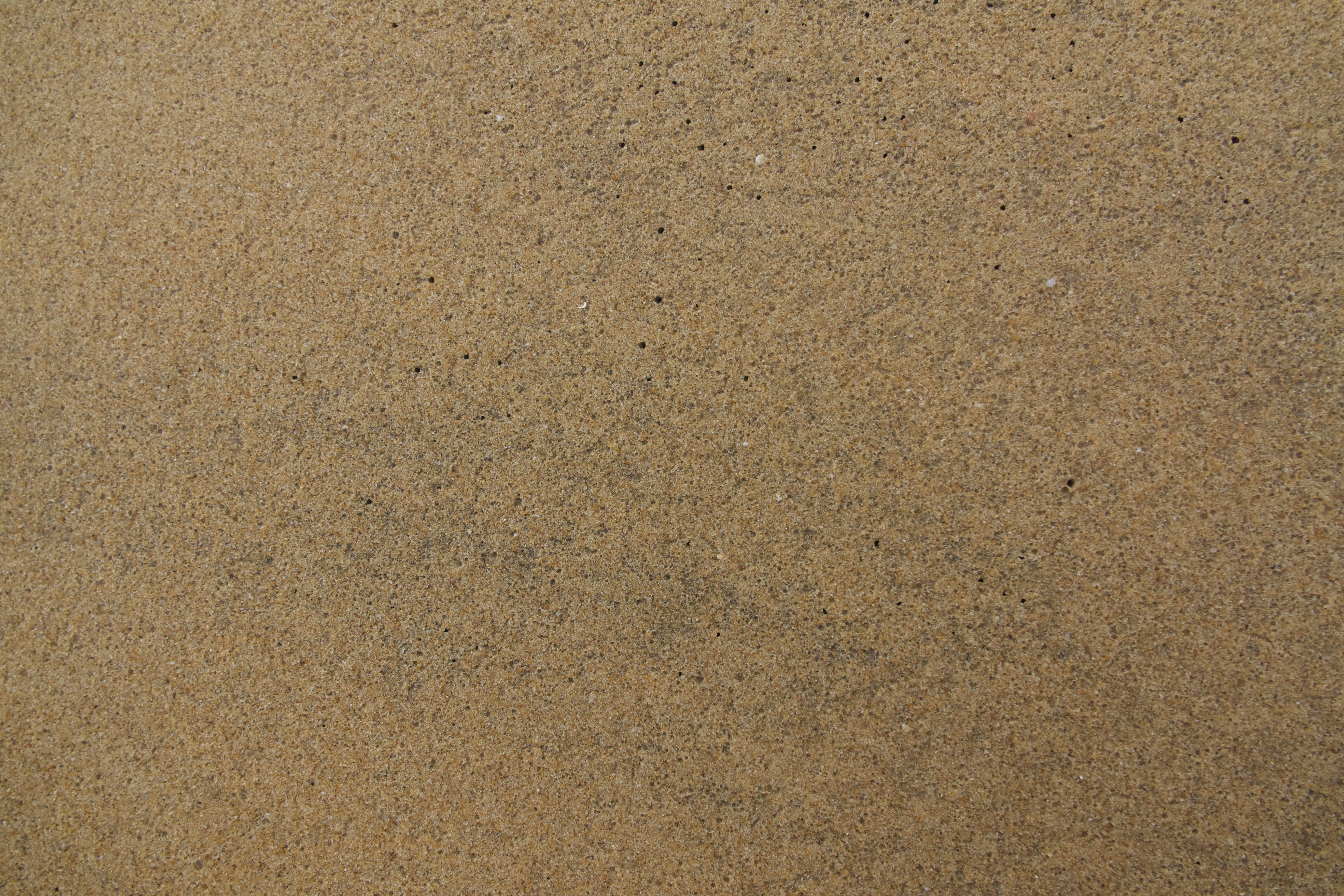 A close up of a sand surface with a small amount of sand photo Free Sri lanka Image on Unsplash