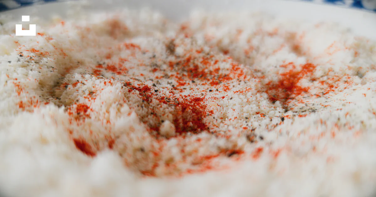 A bowl of rice with a red and white sprinkle photo – Free Food Image on ...