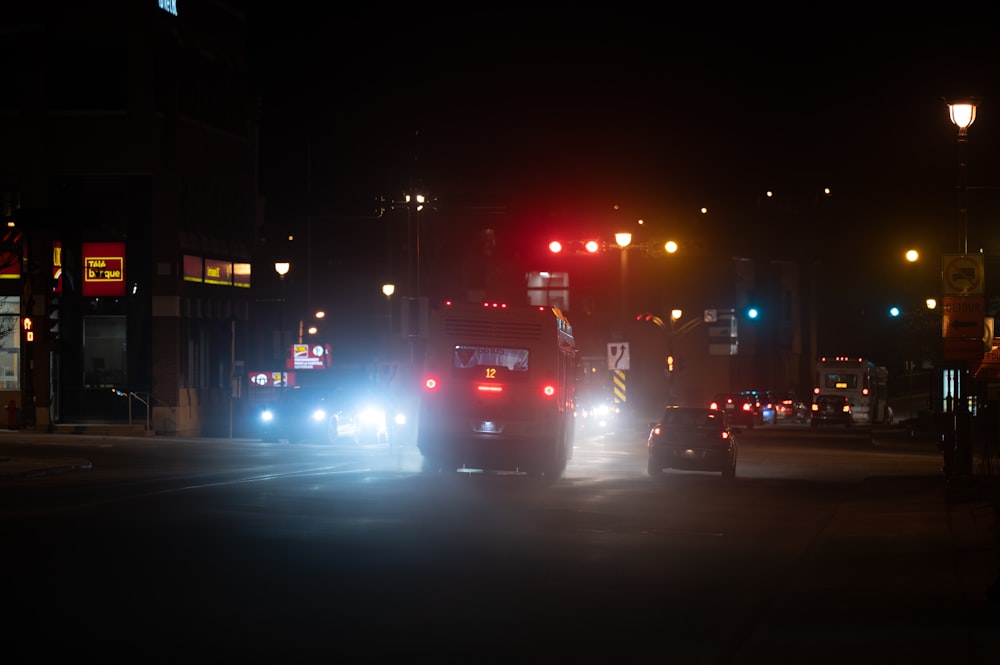 a couple of cars that are sitting in the street