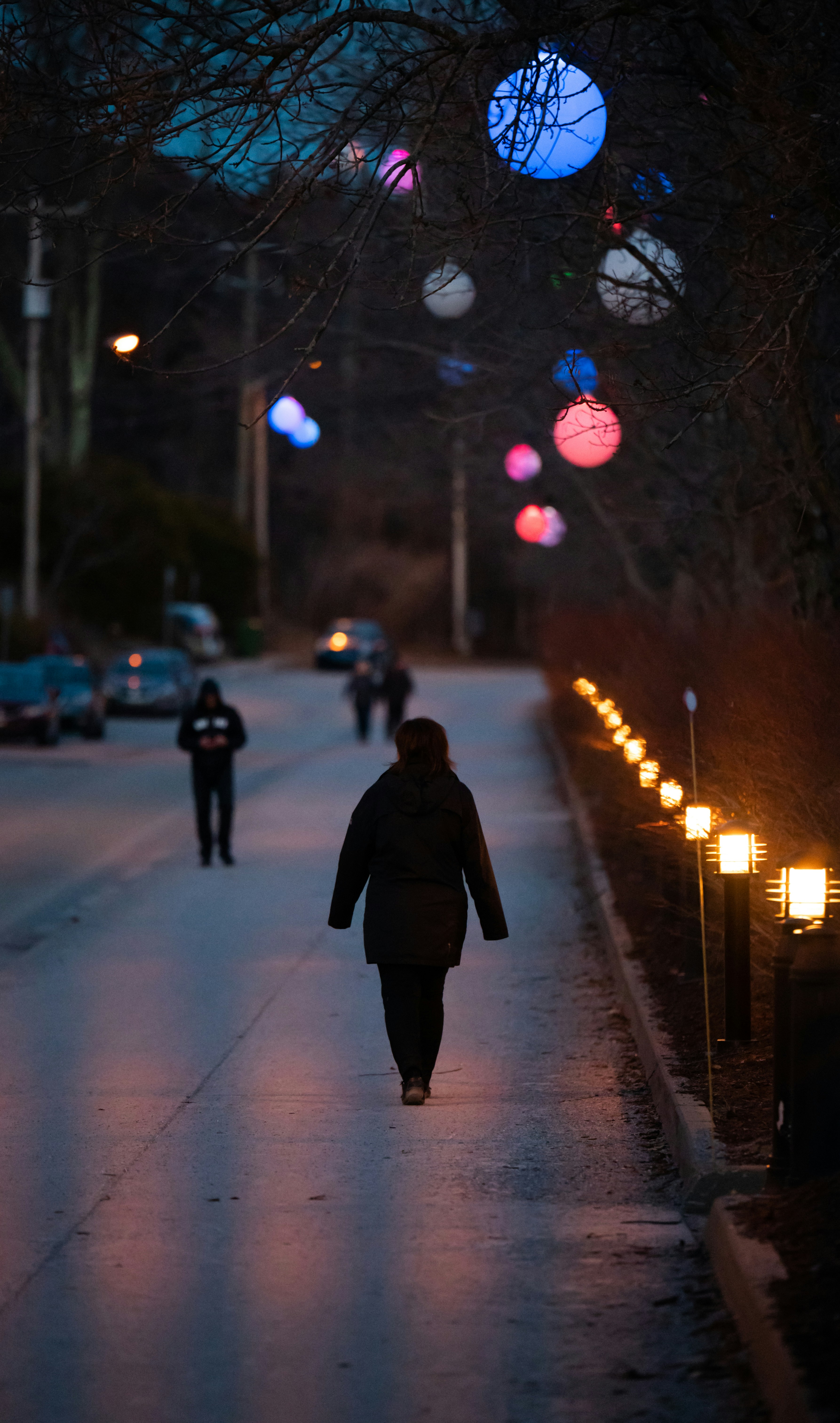 A woman walking down a street at night photo – Free Sherbrooke Image on ...