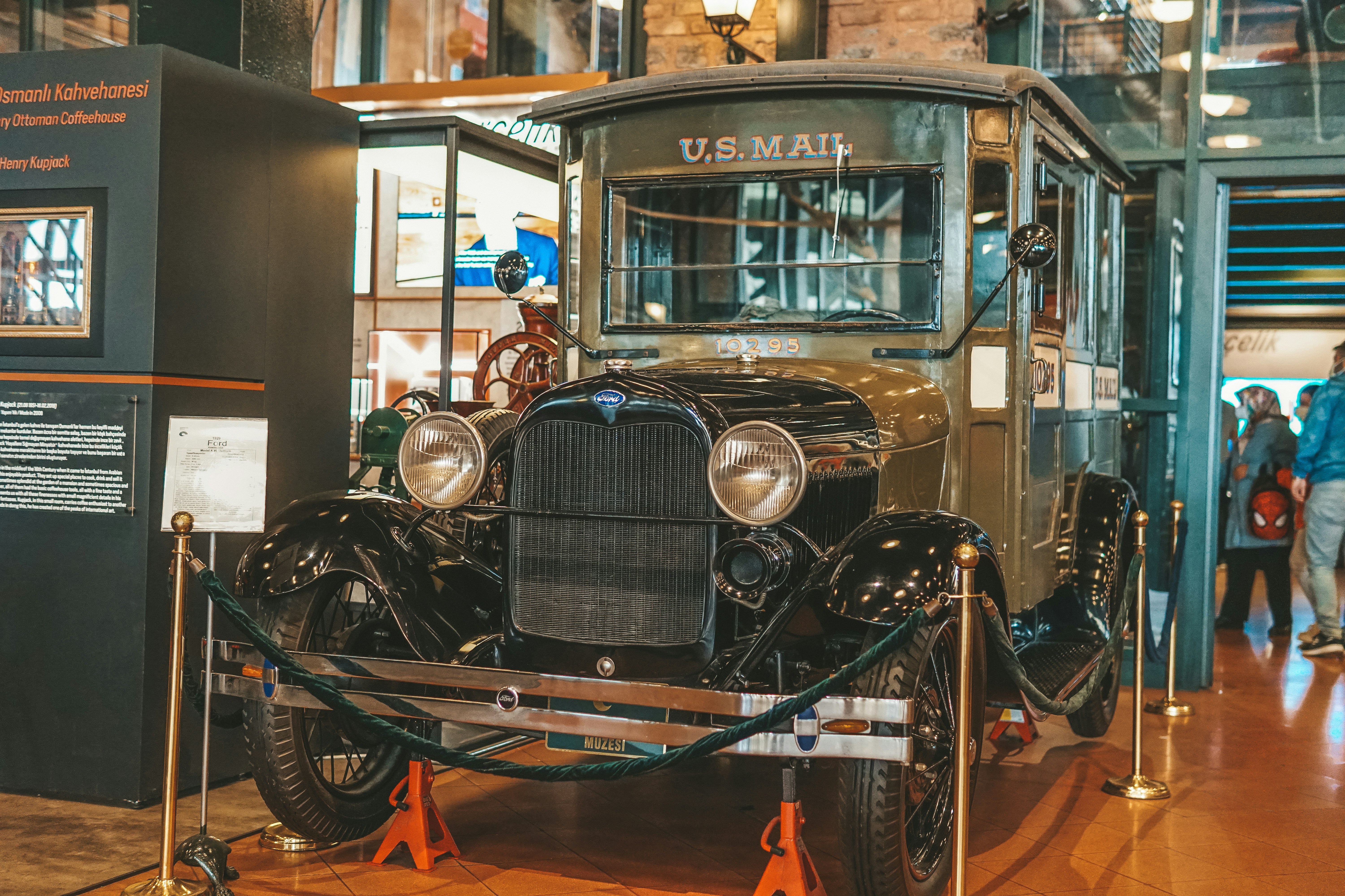 an antique car on display in a museum