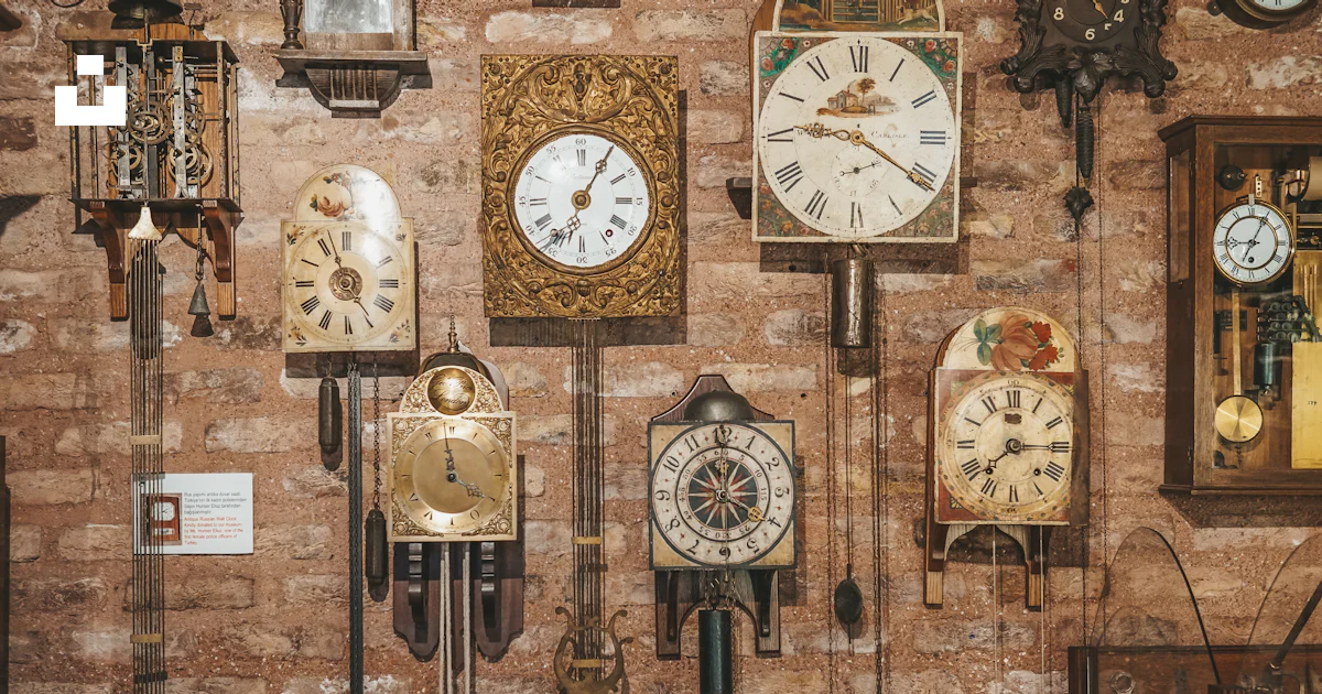 A bunch of clocks that are on a wall photo – Free Haliç Image on Unsplash