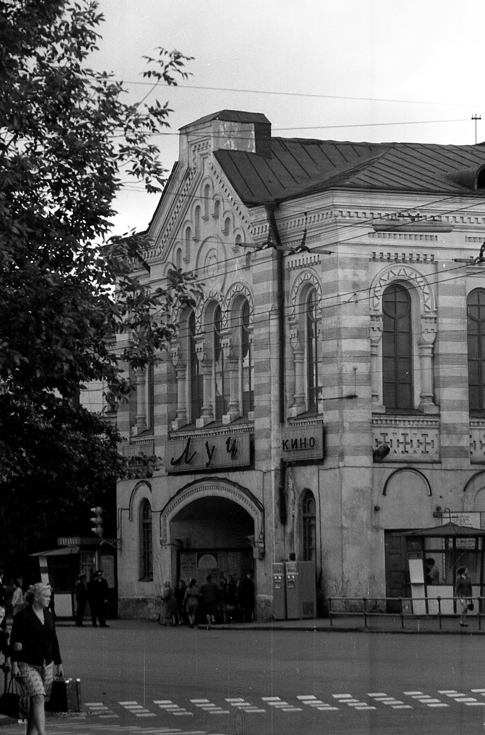 a person standing in front of a building