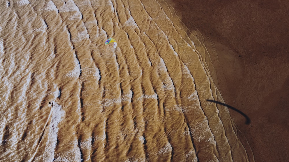 a close up of a bed in a room