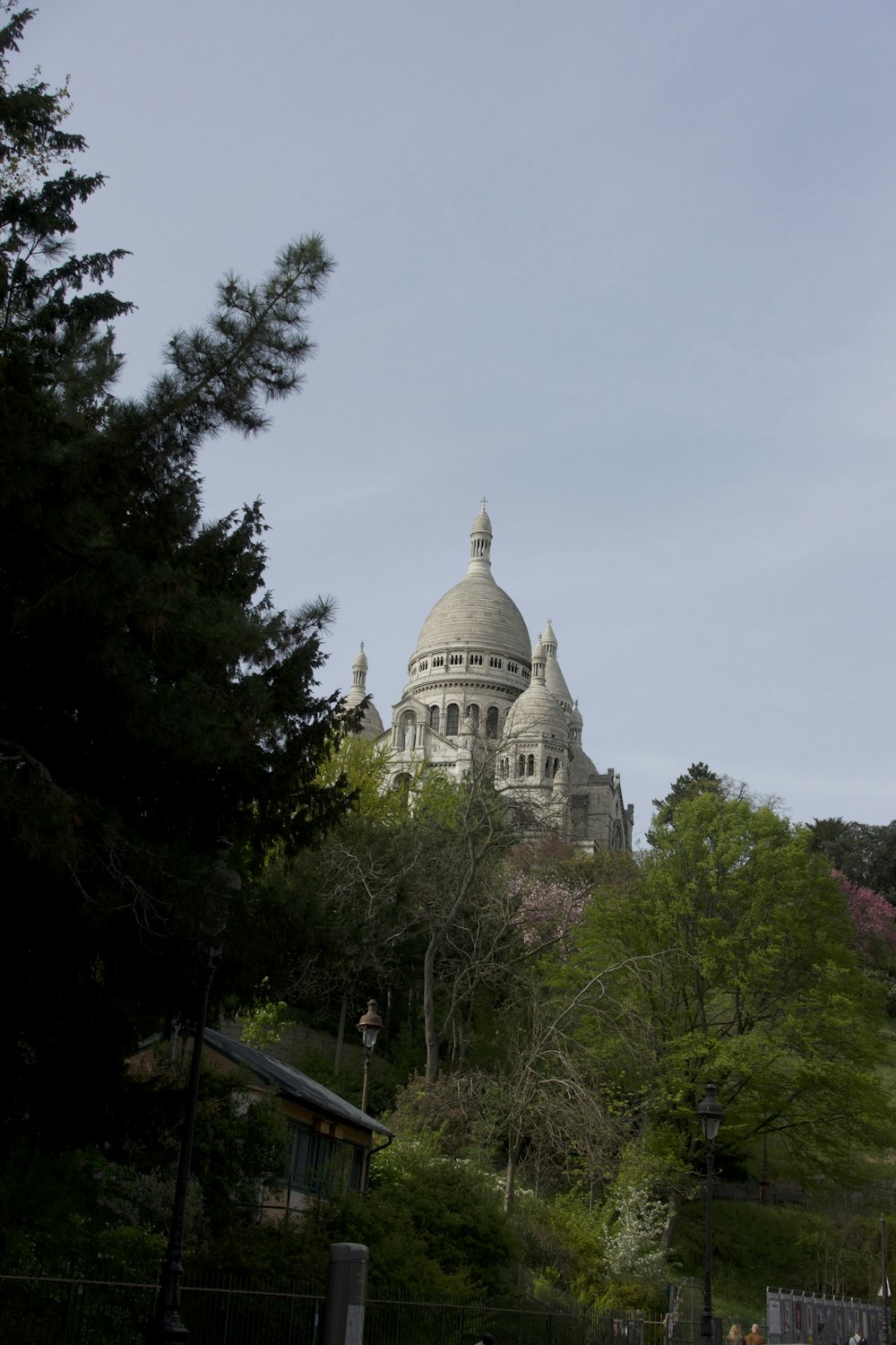 a large building with a dome on top of a hill