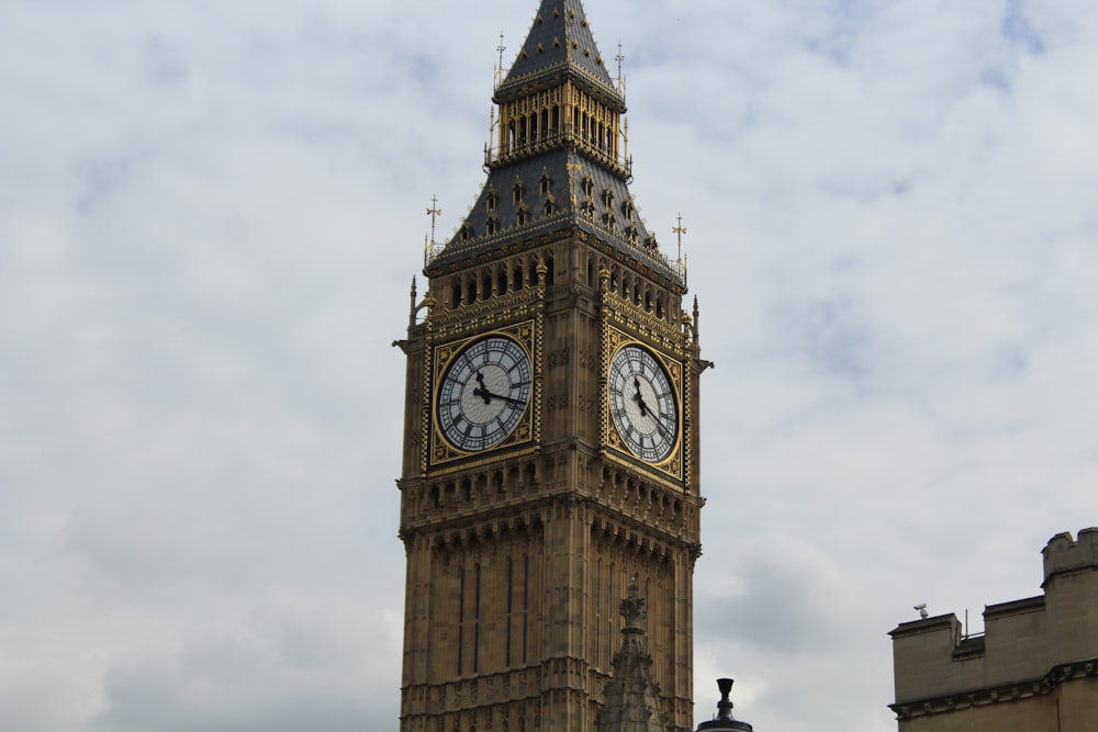 a tall clock tower with a sky background