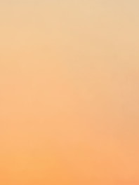 Soft warm white background with subtle golden accents resembling a quiet, meditative atmosphere.