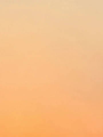 A serene therapy session with warm yellow and green tones reflecting healing and balance.