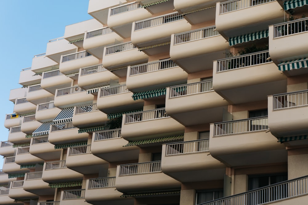 a tall building with balconies and balconies on the balconies