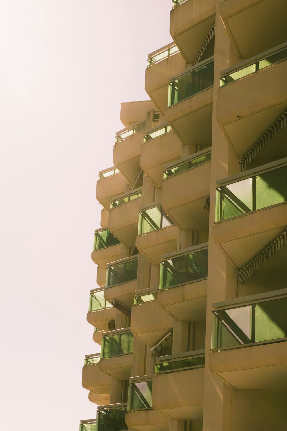 a tall building with balconies and balconies on it