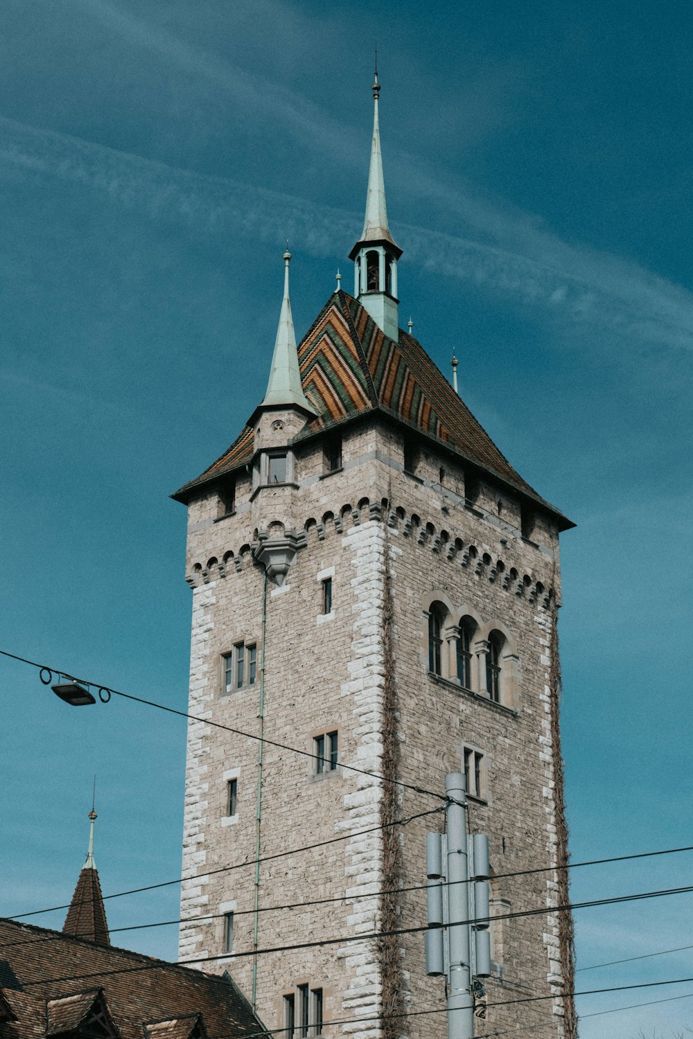 a tall tower with a clock on the top of it