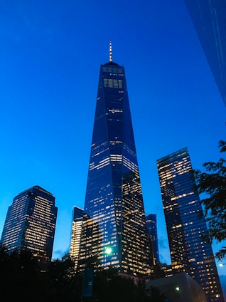 A stunning twilight view of Trilive’s 45-story towers glowing against the evening sky.