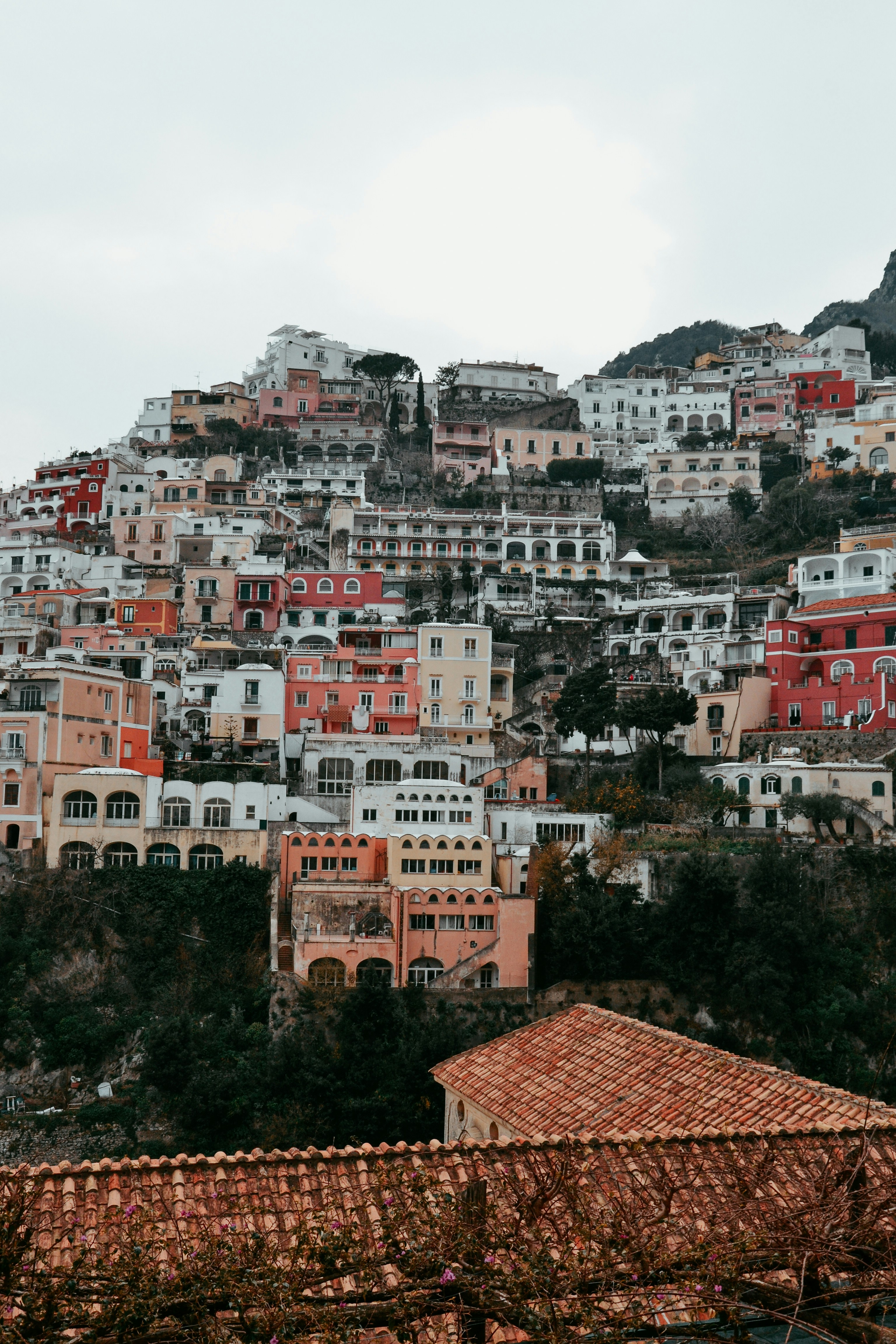 a view of a hillside with houses on it