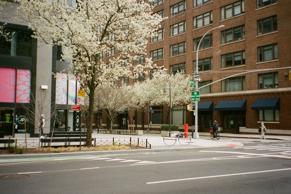 a person riding a bike on a city street