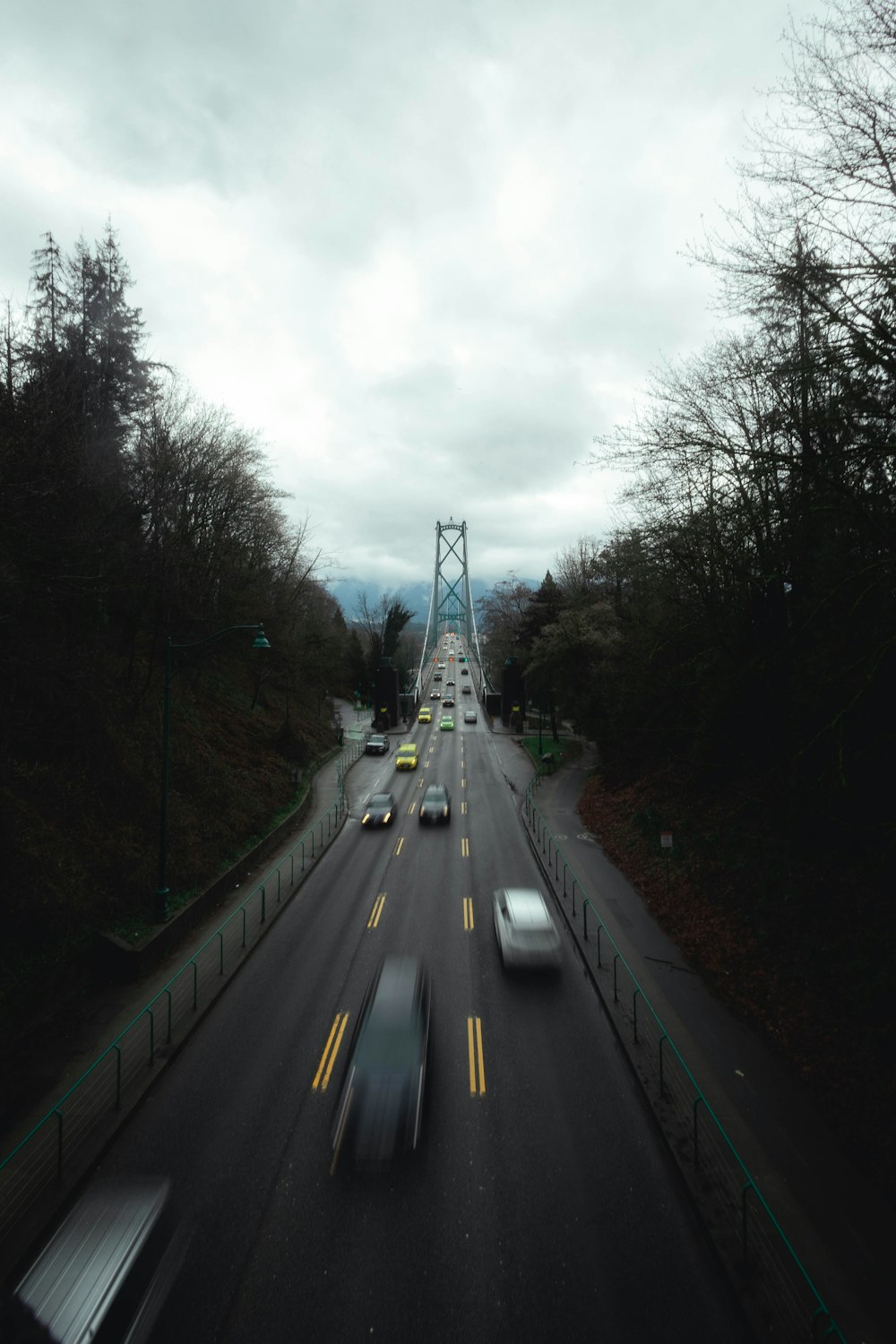 a view of a highway with a bridge in the background