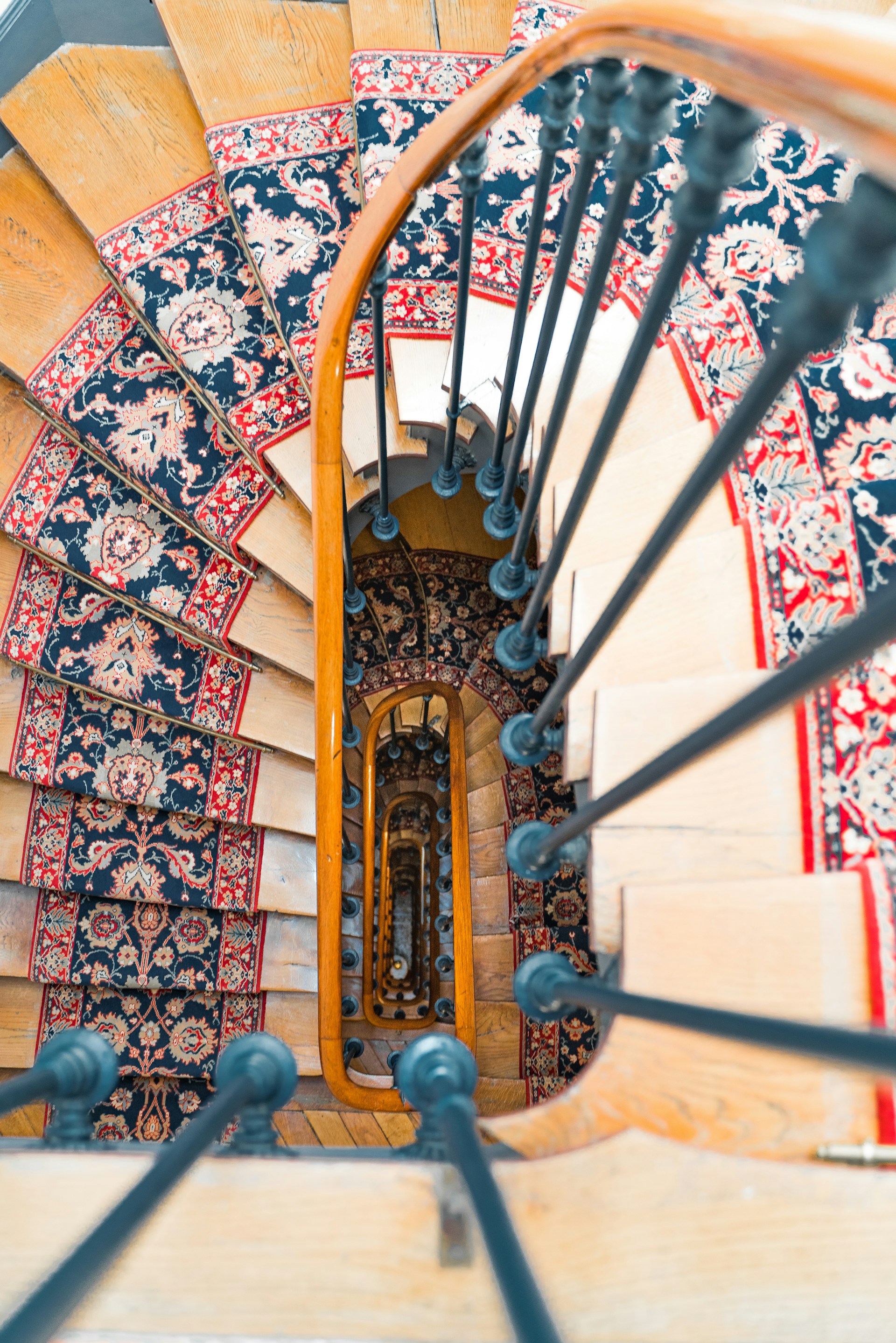 a view of a spiral staircase from the top