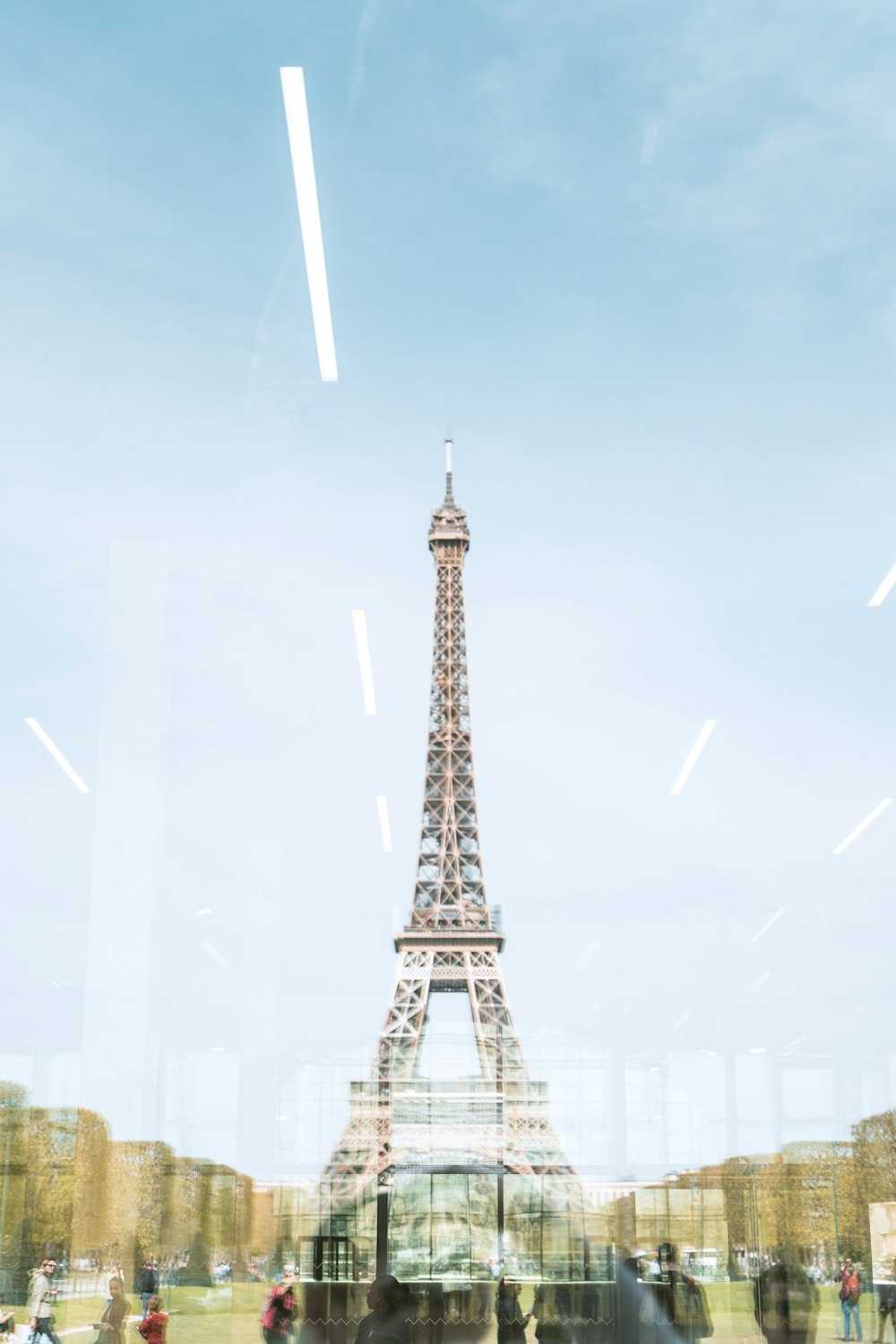 a view of the eiffel tower through a window