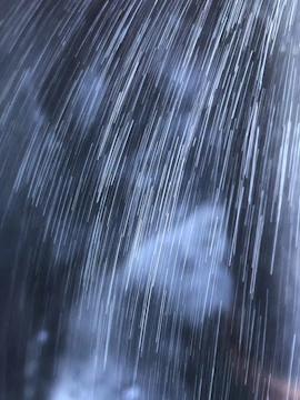 A cinematic still from a luxury fashion video project showcasing dynamic movement and light.