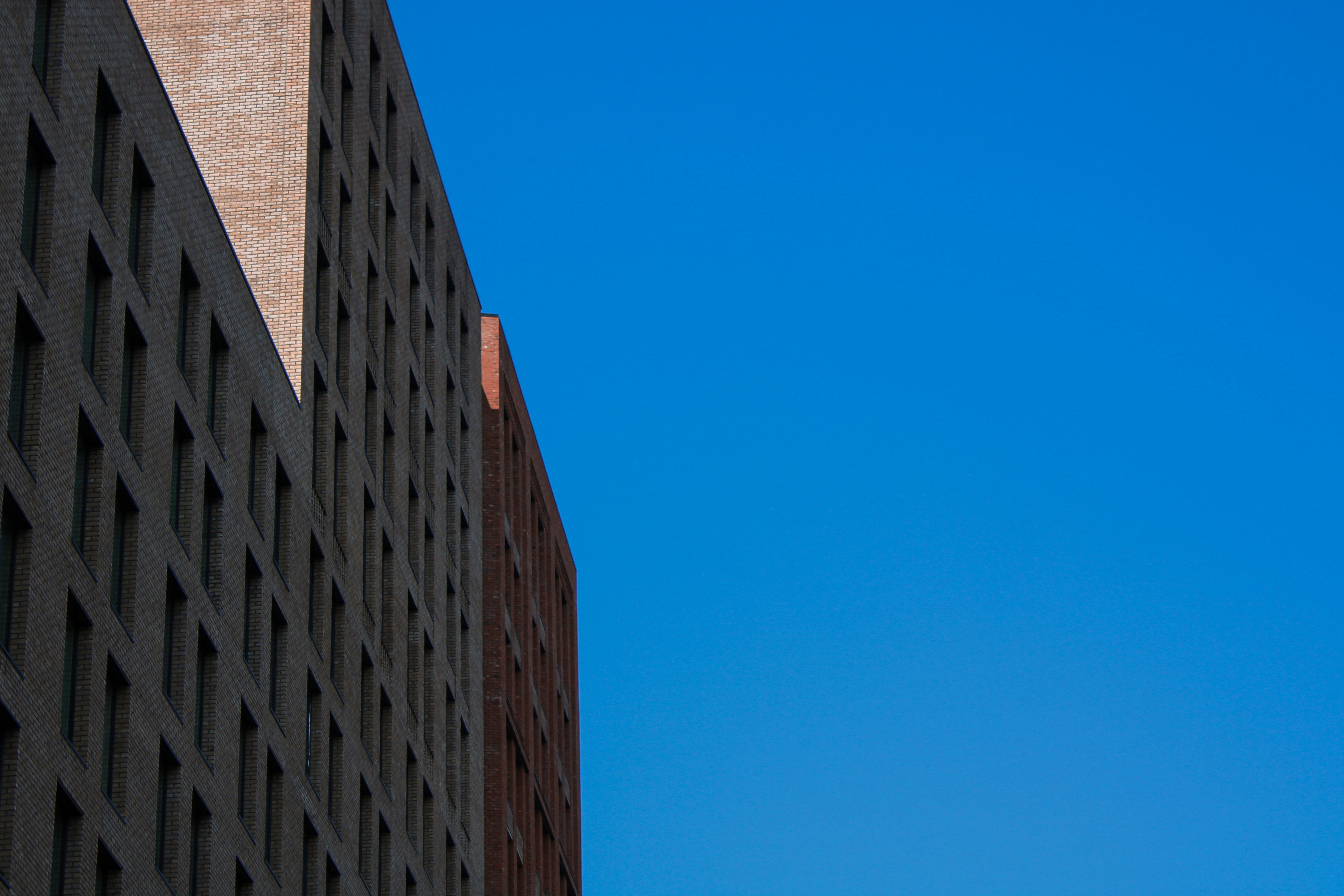 a tall building with a clock on the side of it