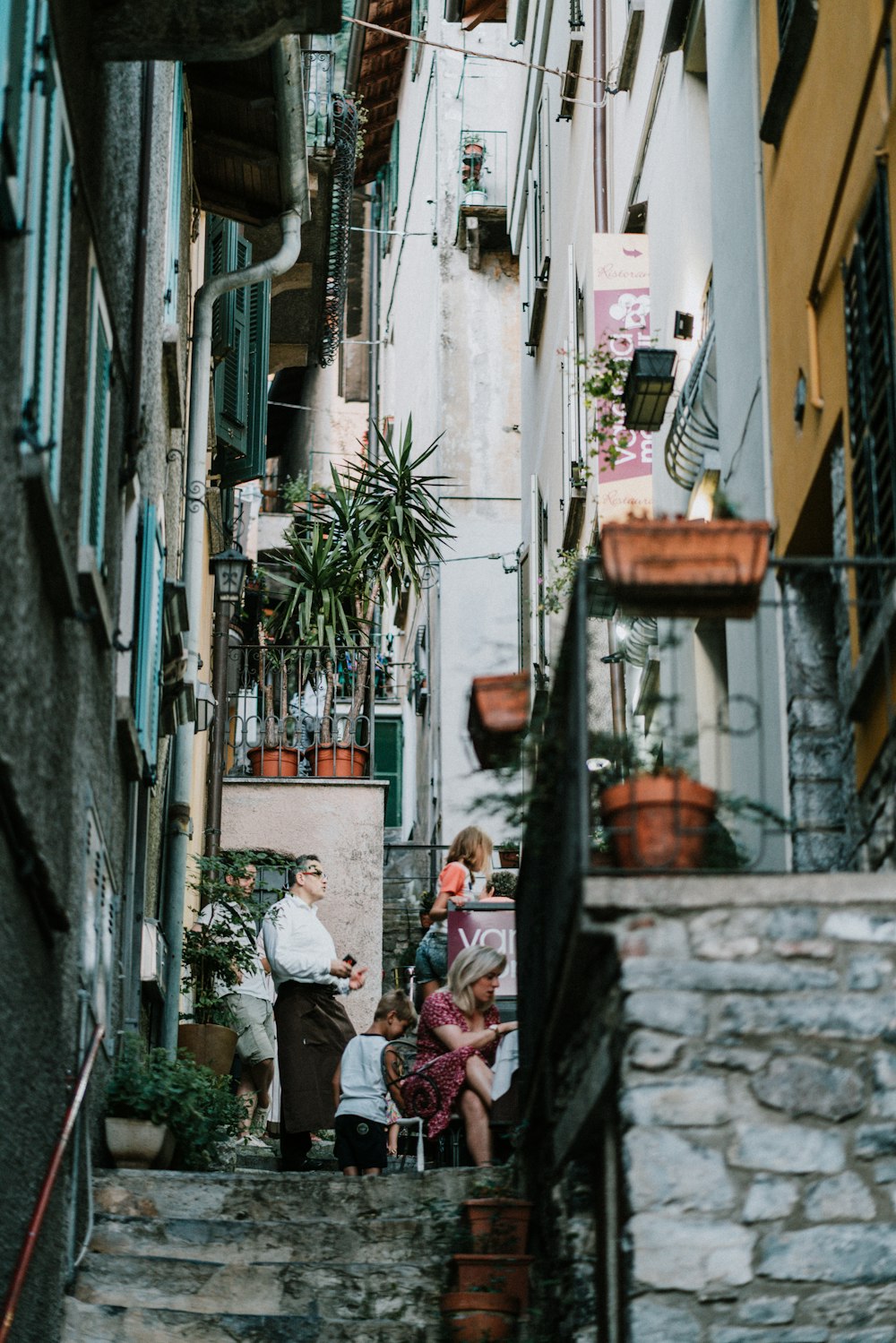 a group of people walking down a set of stairs